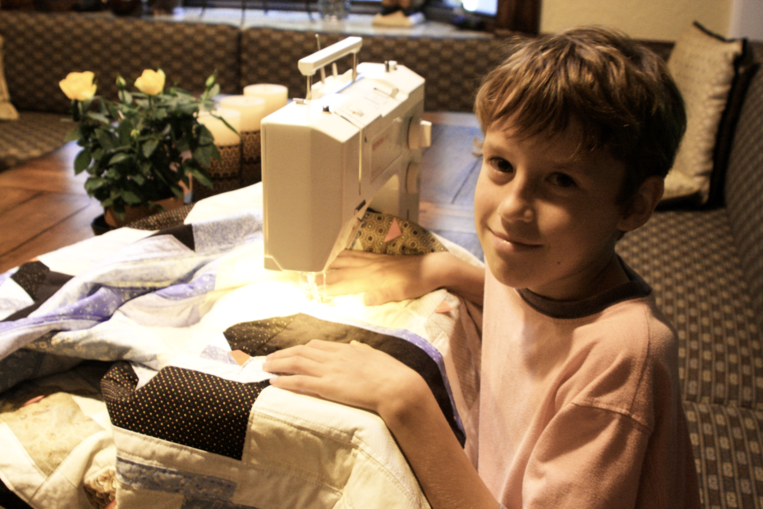 Brian quilting a penguin quilt